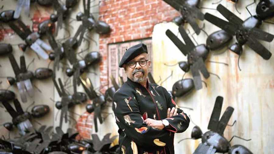 Paresh Maity striking a pose in front of Motion (junk material, 2017)
