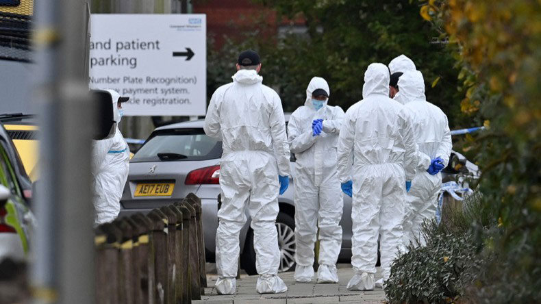 Forensic police officers at the scene of the car blast outside the Liverpool Women’s Hospital on Monday.