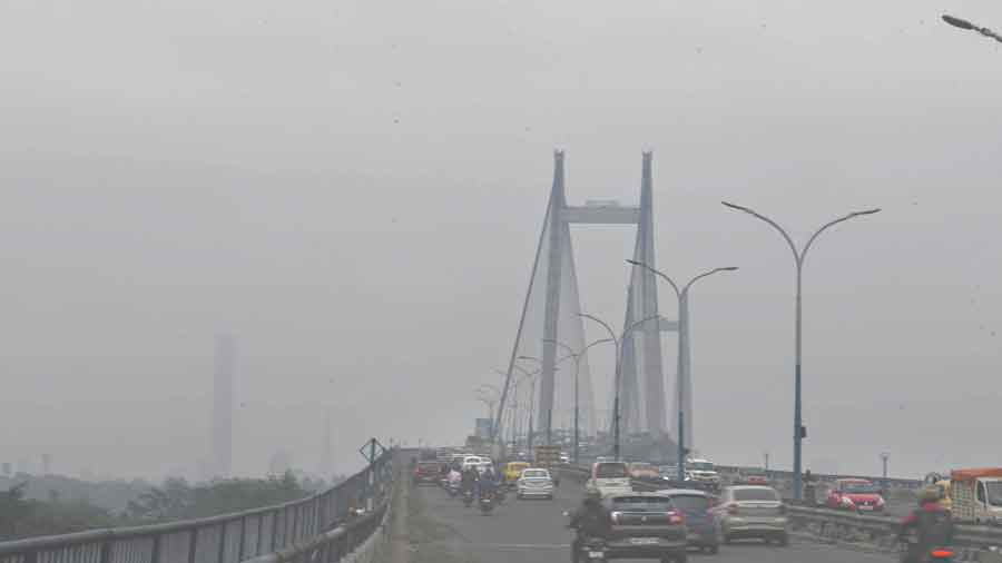 Smog over the Vidyasagar Setu on Monday morning. 