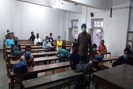 Second-year students of the Mathematics department attend class at Asutosh College.  