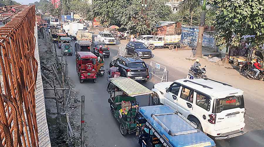 Vehicles stuck in traffic on Burdwan Road, one of the principal thoroughfares  of Siliguri, on Tuesday. 