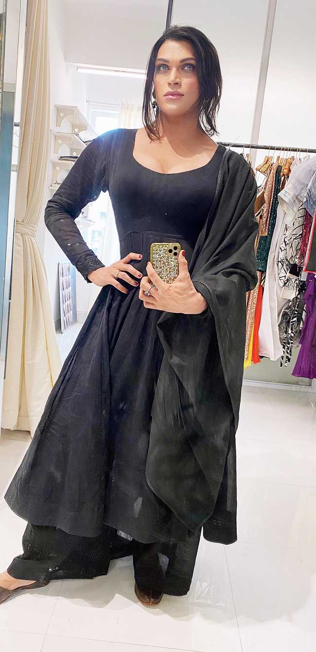 Saisha in the first outfit made by her team for her after her transition