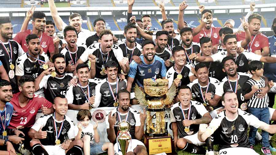 Jubilant Mohammedan Sporting players and support staff after winning the Calcutta Football League title  at the Salt Lake Stadium.