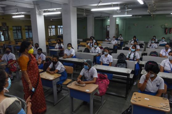 Students in a classroom at Sakhawat Memorial Govt. Girls’ High School on the first day of reopening.