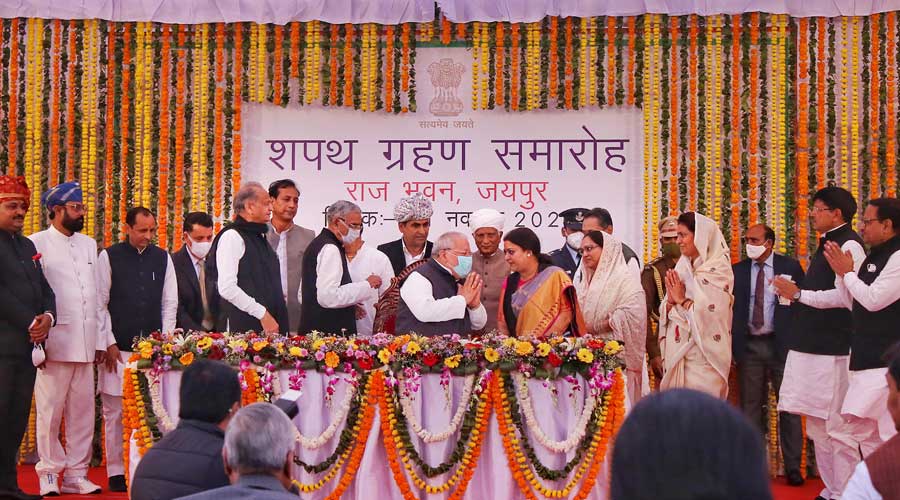Rajasthan Chief Minister Ashok Ghelot and Rajasthan Governor Kalraj Mishra pose with new Cabinet Ministers after the swearing-in ceremony at Raj Bhawan in Jaipur on Sunday.