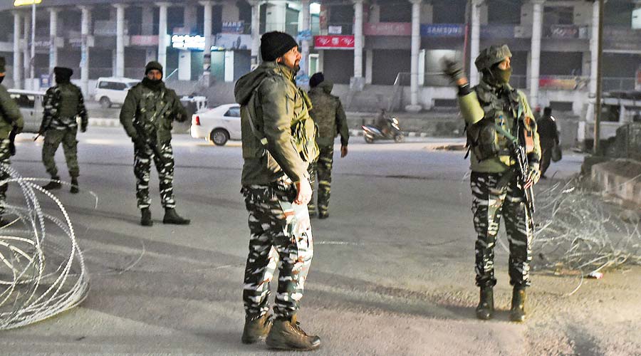 Scribes among dozen raided in Kashmir