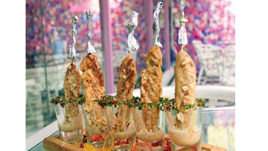 Chicken Satay: This Indonesian-speciality which is slightly sweet in taste, is prepared with grilled chicken on the skewer, dipped in peanut butter sauce and garnished with chunks of nut. Rs 219