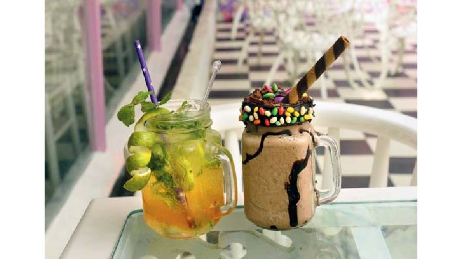 (L-R) Orange Mint Mojito: This refreshing drink in the winter-special orange flavour is prepared with mojito-flavoured soda and garnished with orange crush, lemon chunk and mint leaf. Rs 179 &  Hideout special shake: This thick shake is a hearty combination of chocolate ice cream, milk powder, brownies, Oreo cookies and chocolate sauce. Rs 249