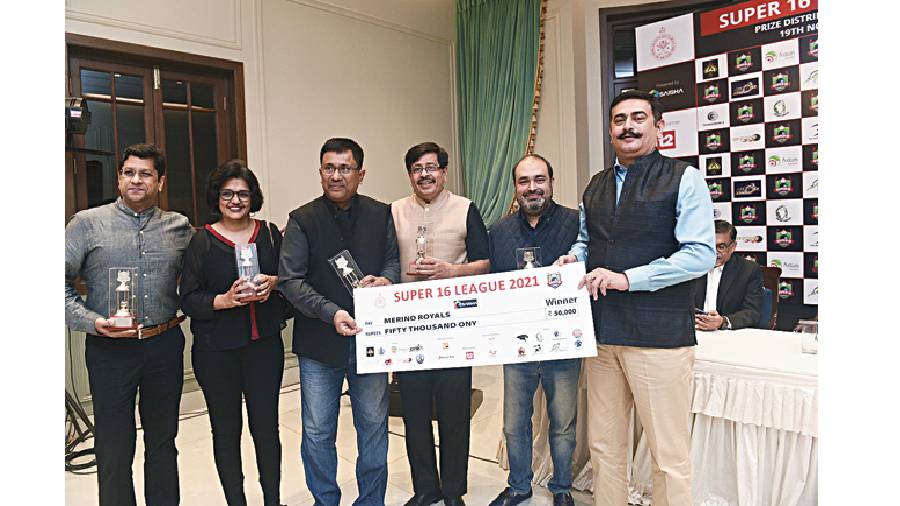 Team Merino Royals bagged the runners-up position with a cheque of Rs 50,000 with owner Timir Roy (third from the left) being awarded the most valuable player award as well.