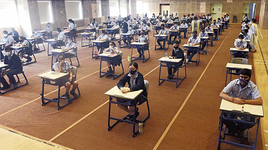 Students of Sri Sri Academy School in the hall for Monday’s ICSE paper.