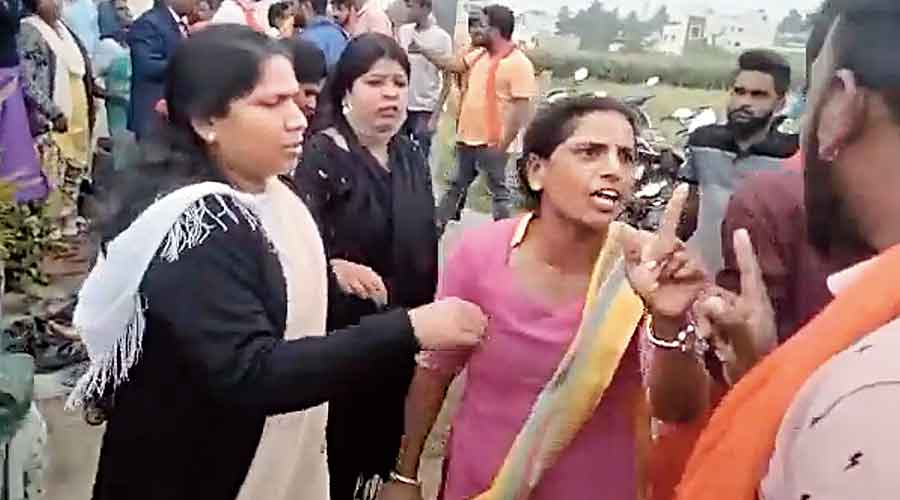 Footage shows women  confronting Bajrang Dal activists  at the Christian prayer hall in Belur city, Karnataka, on Sunday.