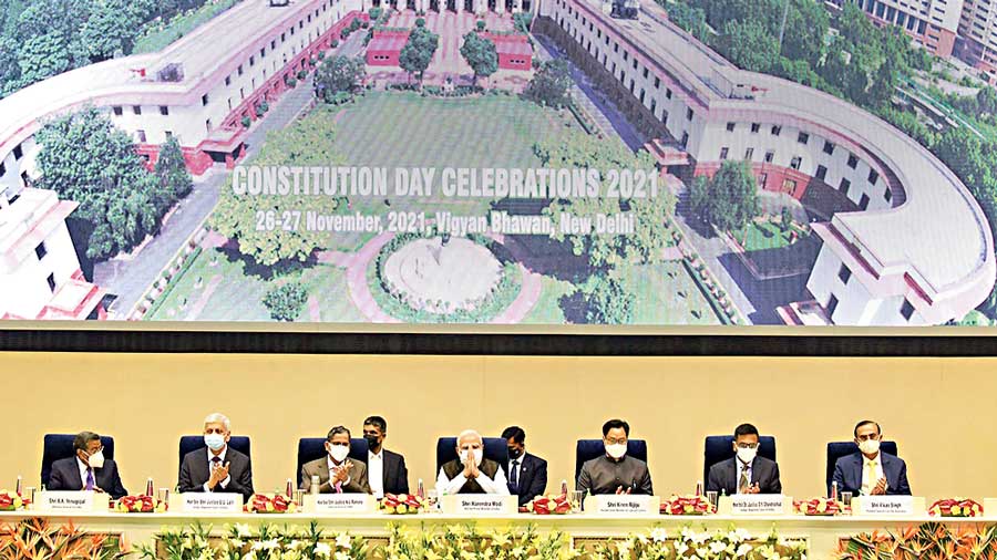 Prime Minister Narendra Modi during the Constitution Day Celebrations, organised by the Supreme Court, in New Delhi, Friday, Nov. 26, 2021. Chief Justice of India & Patron-in-Chief, NALSA, Justice N.V. Ramana, Union Minister for Law and Justice Kiren Rijiju and other dignitaries are also seen.