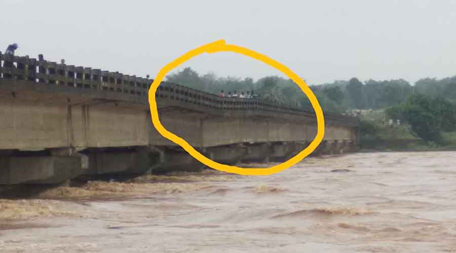 A view of the bridge where a pillar collapsed due to heavy rain on Tundi-Jamtara bridge on Thursday night.
