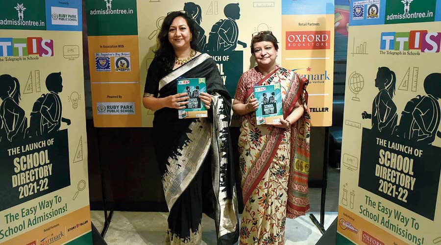 Janet Gasper Chowdhury and (right) Joyita Majumder launch the TTIS School Directory 2020-21. 