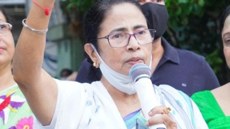 Mamata Banerjee on Sunday outside her Calcutta residence