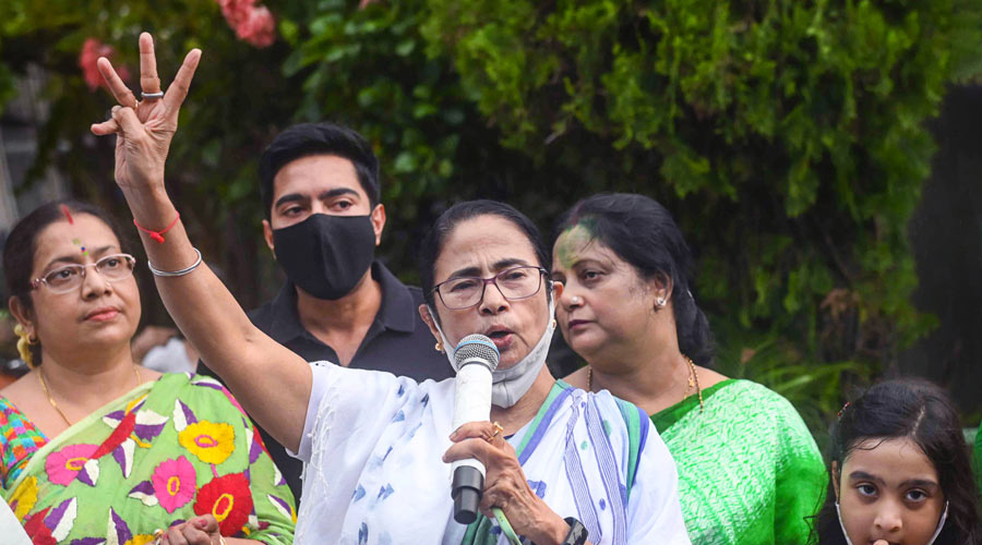 West Bengal Chief Minister and TMC candidate from Bhowanipore contituency Mamata Banerjee after her victory in by-polls, at her Kalighat residence in Calcutta, Sunday, Oct. 3, 2021.