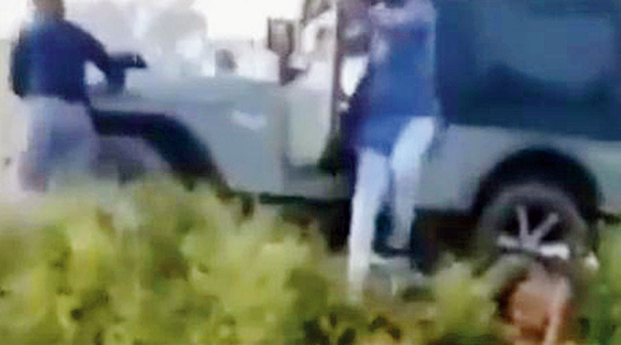 A man is seen getting out of the SUV and running. 