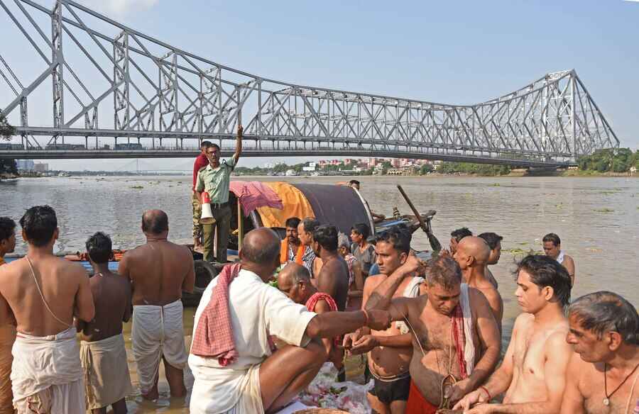 Mahalaya arrived with a blue sky but the day turned cloudy soon, adding to Kolkata's worry about rain in the festive days