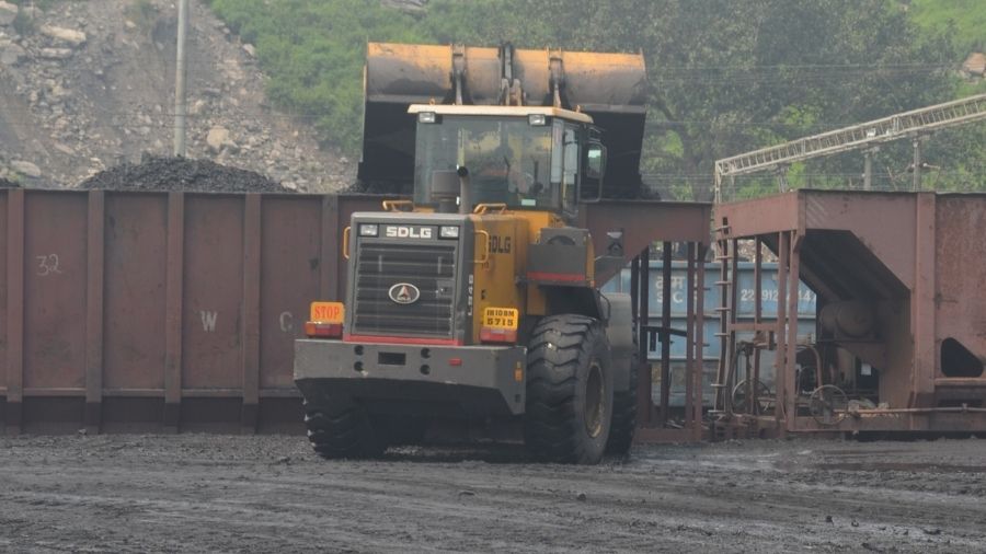 Coal being loaded in railway wagons at a coal loading siding of BCCL in Dhanbad. 