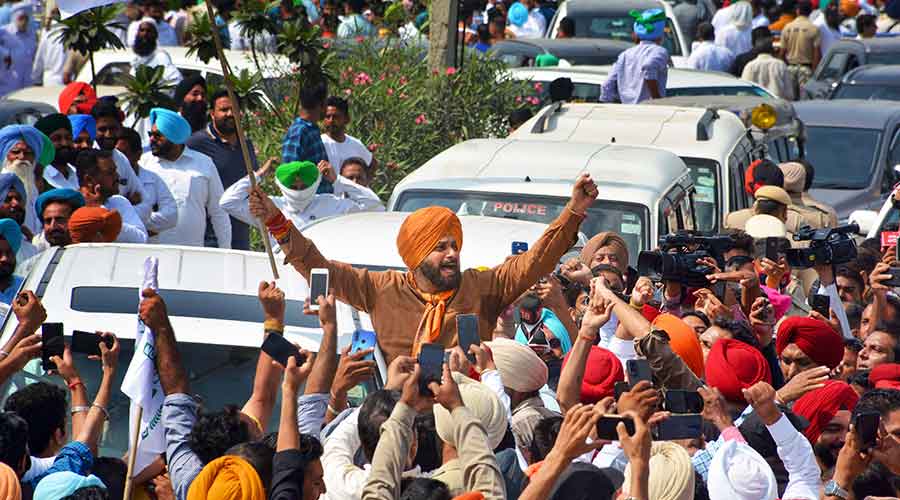 Congress leader Navjot Singh Sidhu with supporters, marches towards Uttar Pradesh’s Lakhimpur Kheri district, from Mohali on Thursday, Oct 7, 2021.