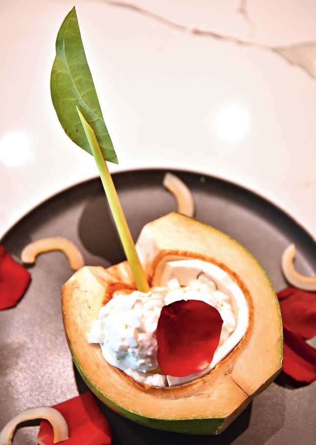 End your meal with Tender Coconut Ice Cream with Coconut Jelly, all home-made, served in tender coconut shell and garnished with rose petals.