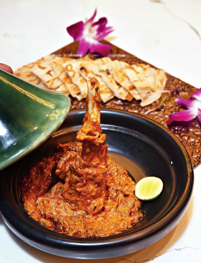 Lamb Shank is not to be missed and definitely one of the yummiest dishes on the menu. Cooked for several hours, this one is soaked in creamy and flavourful curry and served with hot Malabar paratha.