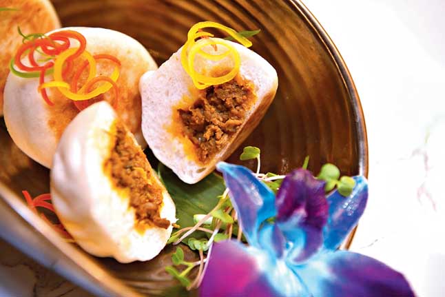  Kosha Mangsho Bao are freshly made, soft and fluffy, stuffed with the famous Bengali kosha mangsho as filling.