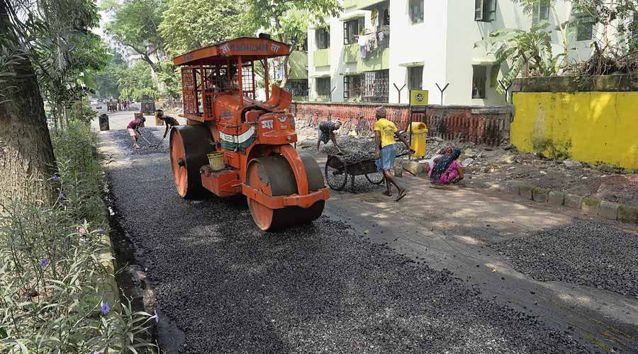 A road in BF Block, Salt Lake, being repaired on Friday. 