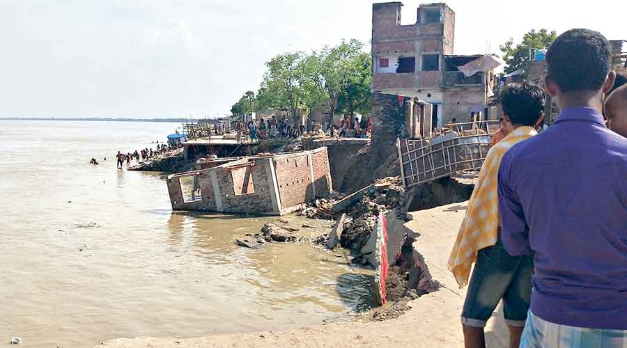 Homes swallowed by the Ganga.