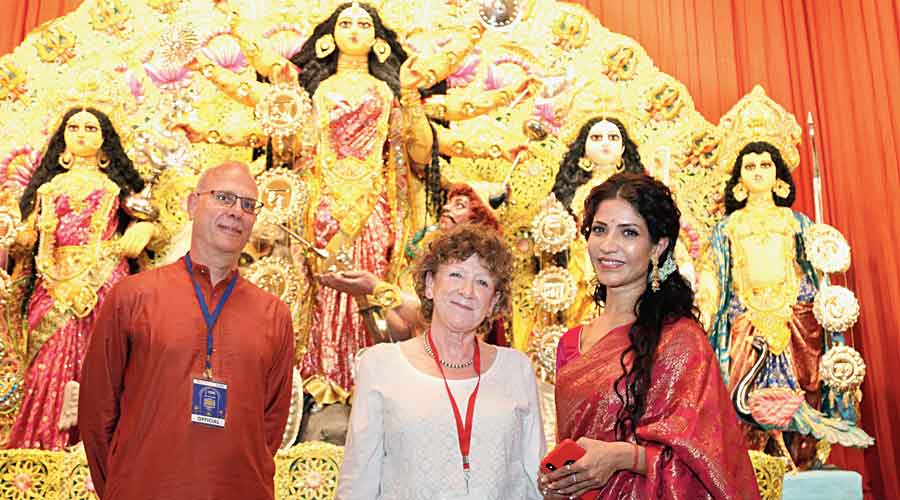 Five star puja: (From left) British Council regional director, South Asia, Adrian Chadwick; director, British Council, India, Barbara Wickham; and actress Richa Sharma at Kanai Dhar Lane Adhibasi Brinda puja.