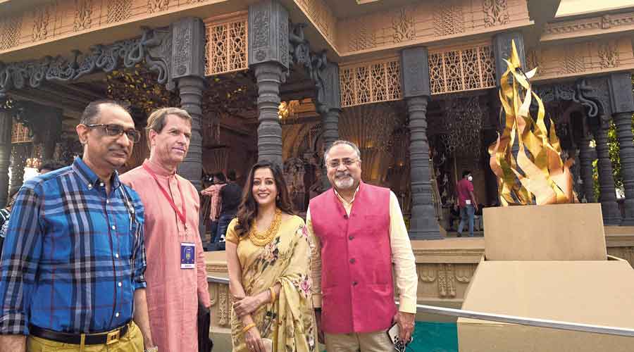 Five star puja: (From left) Imran Zaki, director, David & Goliath Films; Manfred Auster, German consul general;  actress Raima Sen; and Lal Bhatia, chairman, David & Goliath Films, at the Chetla Agrani puja .