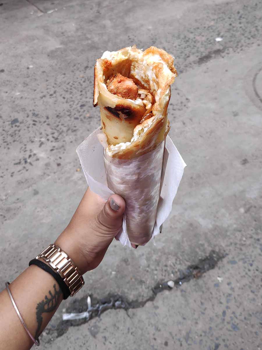ROLL FROM KUSUM ROLLS: Fluffy eggs on a chewy paratha wrapped around spicy meats or paneer? Sign us up! You can even add mayonnaise, cheese, double eggs and meat of your choice at this popular Park Street snack stop. 
