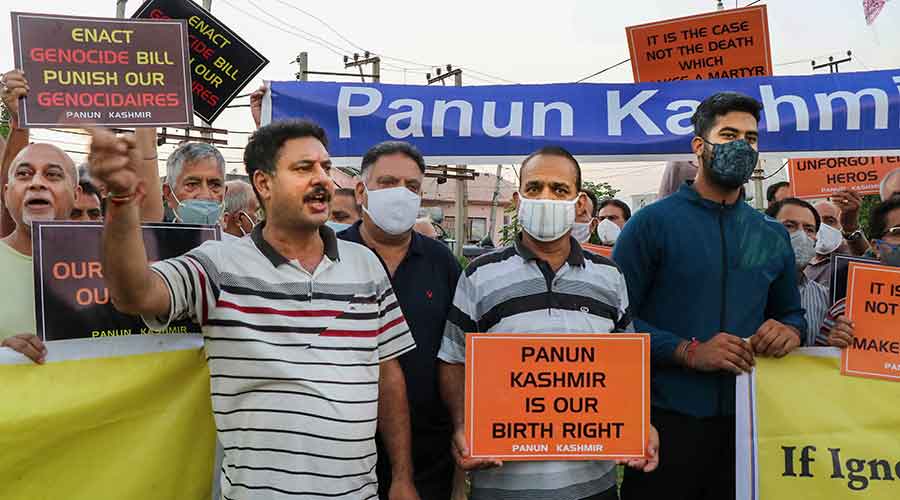 Members of Panun Kashmir shout slogans during a protest after militants shot dead two teachers in Srinagars Eidgah Sangam area, in Jammu on Thursday, Oct. 7, 2021.