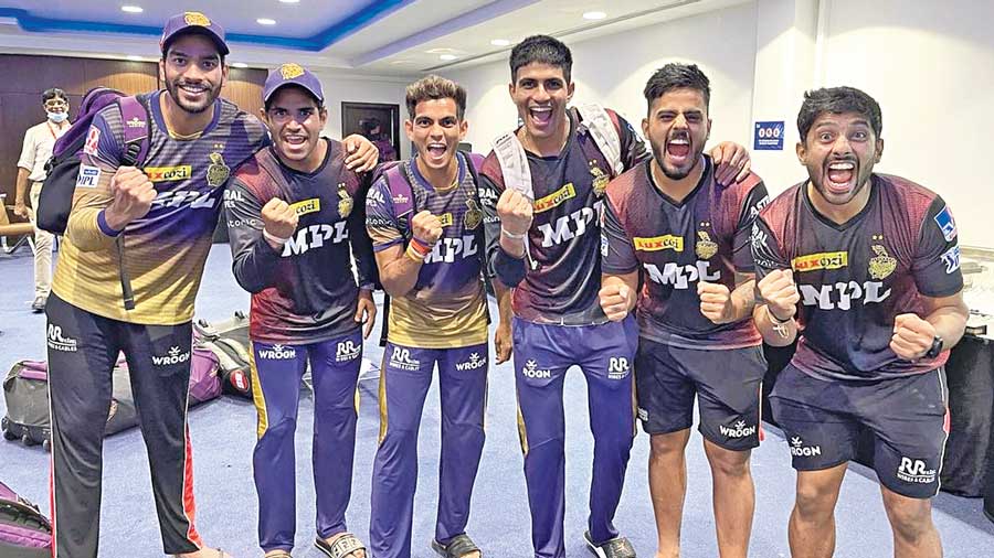 Venkatesh Iyer, Shivam Mavi, Kamlesh Nagarkoti, Shubman Gill, Nitish Rana and (right) Rahul Tripathi of KKR after beating Delhi Capitals on Wednesday in Sharjah. 