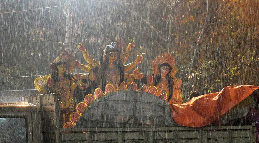 Many parts of the city got sharp spells of rain and thunderstorms on Friday evening after an exceptionally sultry day.  Around 6pm, the rain in Babughat had reduced visibility. The idols headed for immersion were getting drenched, some despite a plastic cover.  Rain had spared Kolkata for most of this Puja. On Navami evening, some parts saw brief and scattered spells.