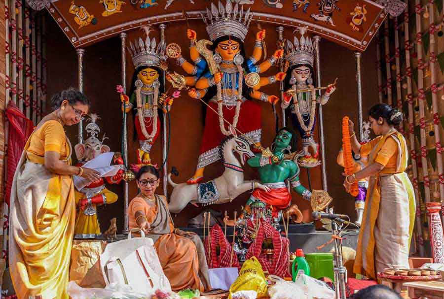 SHE THE PEOPLE: Sashthi rituals underway on Tuesday, October 12 at the 66 Pally Durga Puja in south Kolkata, which smashed an unwritten rule by having an all-women team of priests
