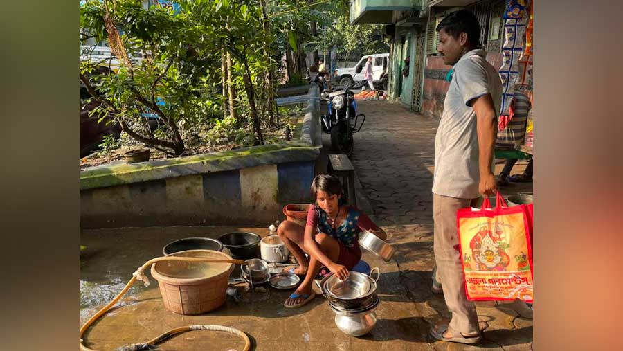  Puja at work washing utensils