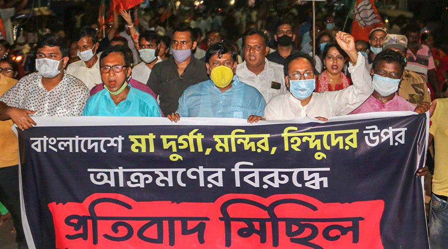 West Bengal BJP workers during a protest rally against the alleged attack on ISKCON temple in Bangladesh, at Balurghat in South Dinajpur district, Sunday