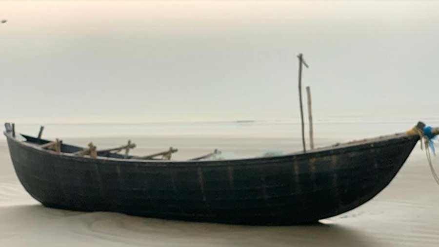 A boat bobs on disappearing waters