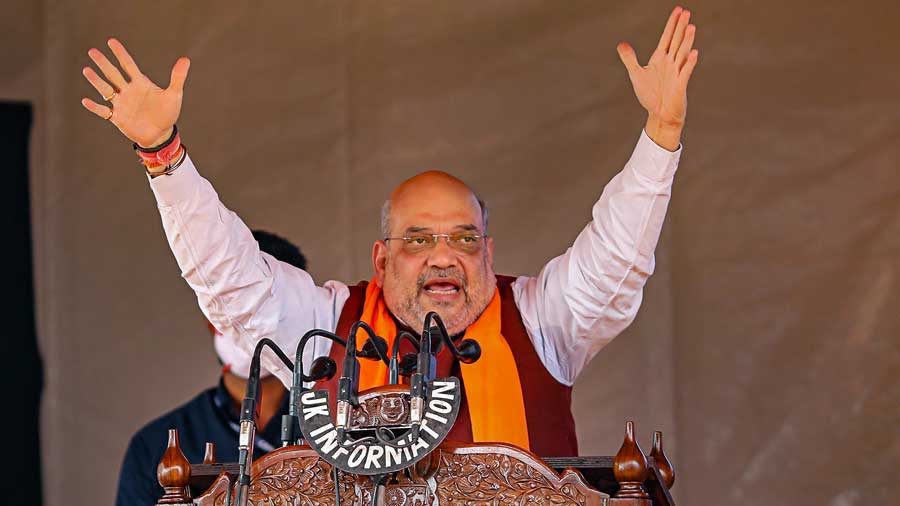 Union Home Minister Amit Shah addresses during a public rally at Bhagwati Nagar in Jammu, Sunday, Oct. 24, 2021.