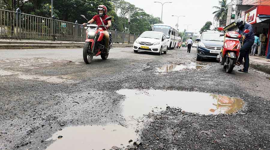 a potholed stretch of Jessore Road.