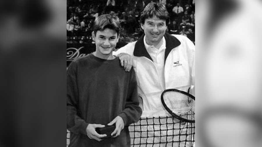 Ball boy Roger Federer with Jimmy Connors 