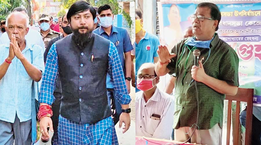 BJP’s Dinhata bypoll candidate Ashok Mondal (with folded hands) and Nisith Pramanik (in blue), and his Trinamul rival Udayan Guha (right) on campaign trail.