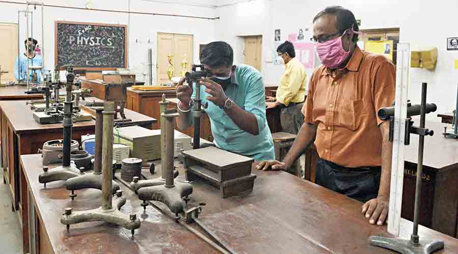 Equipment at the physics laboratory at New Alipore College being checked on Wednesday. 