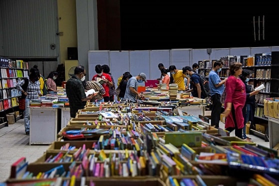 Bibliophiles flock to Lock the Box at Ice Skating Rink. 