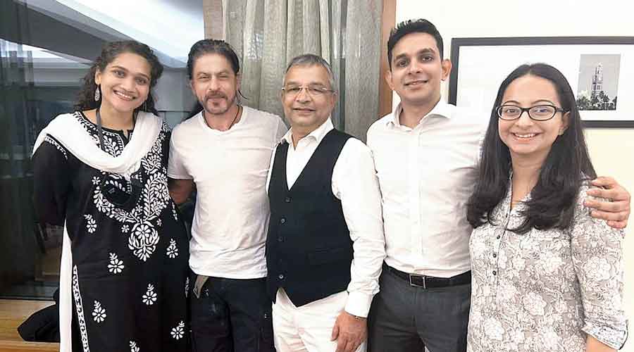 Shah Rukh Khan with his friends and legal team in Mumbai on Thursday after Bombay High Court granted  bail to his son Aryan