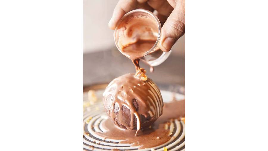 Round off your meal by digging into a hazelnut choco mousse.  Dome-shaped, this rich dessert crumbles into pieces (thanks to hot chocolate sauce) and reveals satin-soft chocolate and hazelnut mousse.