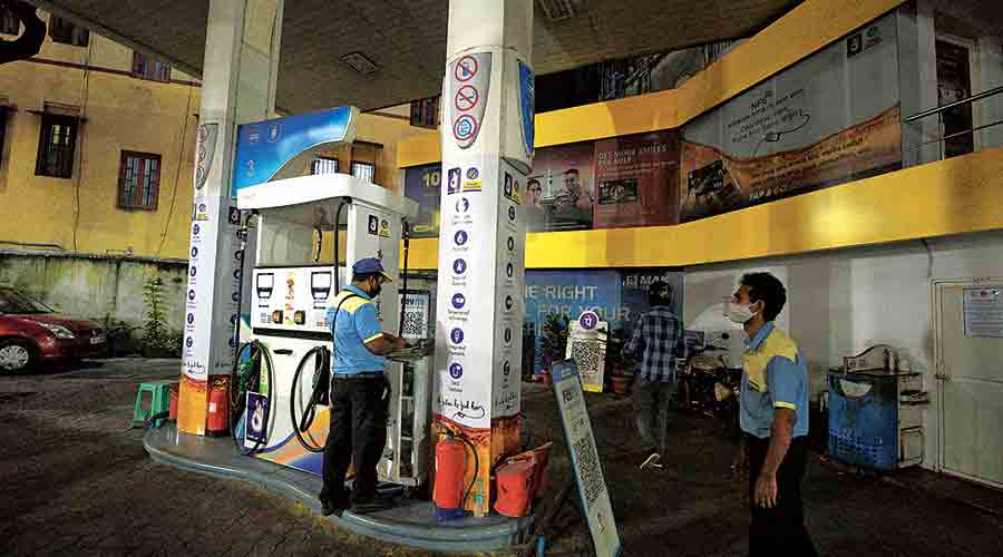 A petrol pump on CR Avenue with its lights switched off on Thursday evening. Many pumps across Kolkata switched off their lights from 7pm to 8pm as a token protest against skyrocketing fuel prices. Most pumps had suspended sale during the period. 