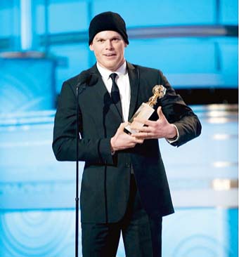 Michael C. Hall accepting his Golden Globe statuette for Dexter in 2010, right after his treatment for cancer