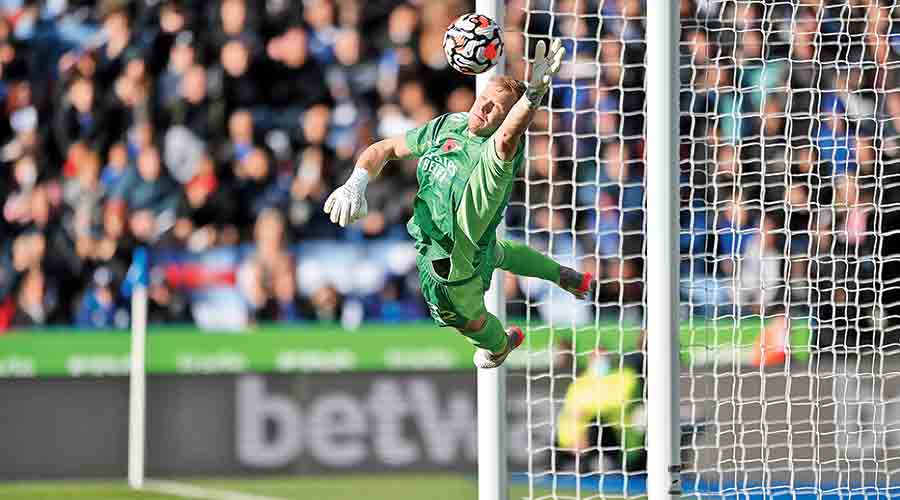 Arsenal goalkeeper Aaron Ramsdale makes a save during their match against Leicester City on Saturday. 